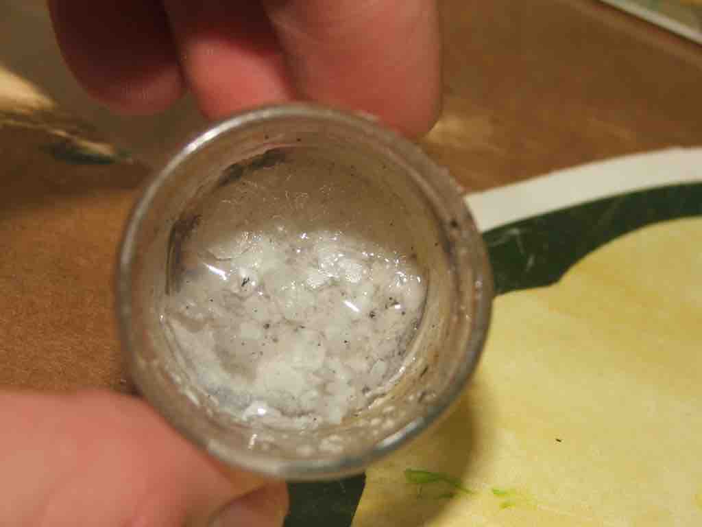 Lithium hydroxide with carbonate growths