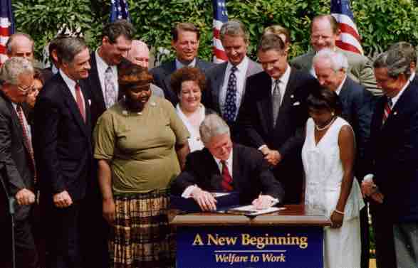 Former President Bill Clinton signing welfare reform
