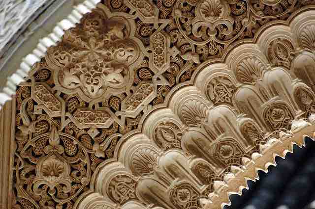 Detail of arabesque decoration at the Alhambra in Spain