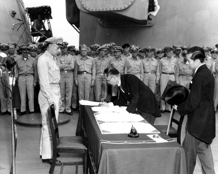 
Japanese foreign affairs minister Mamoru Shigemitsu signs the Japanese Instrument of Surrender on board the USS Missouri, 2 September 1945.