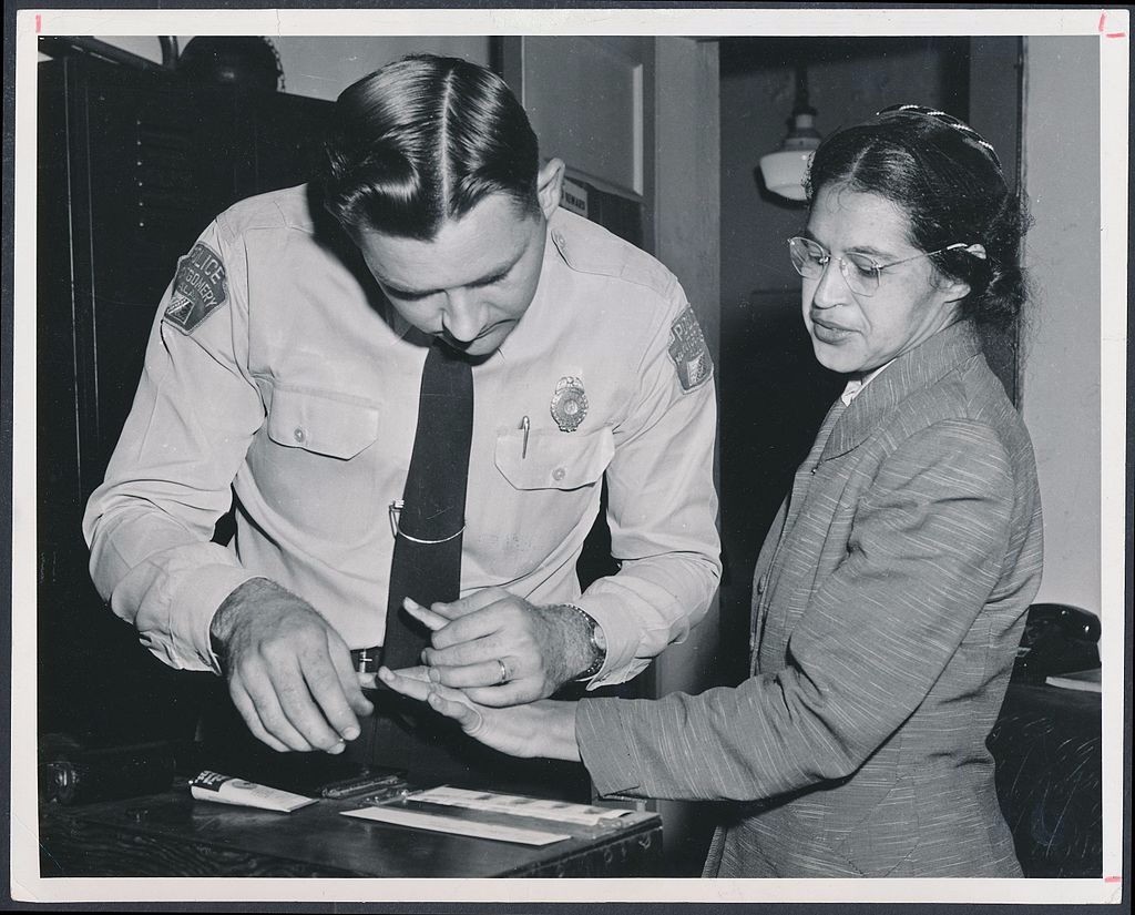 
Rosa Parks being fingerprinted by Deputy Sheriff D.H. Lackey after being arrested for boycotting public transportation, Montgomery, Alabama, February, 1956.