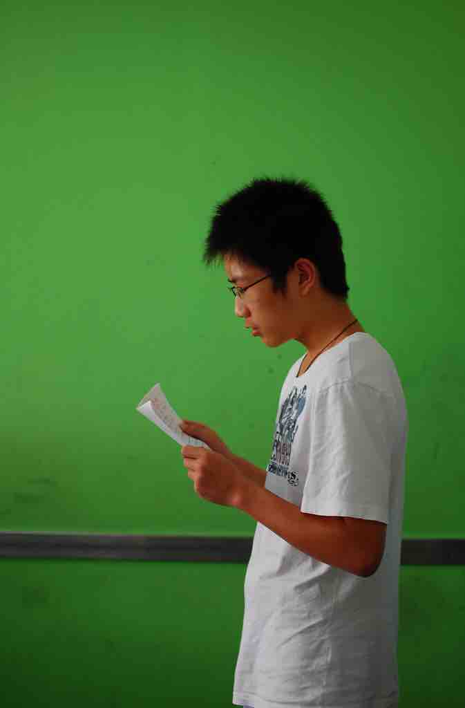 A student rehearses his speech.