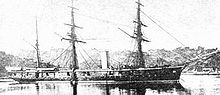 Three-masted armoured warship.